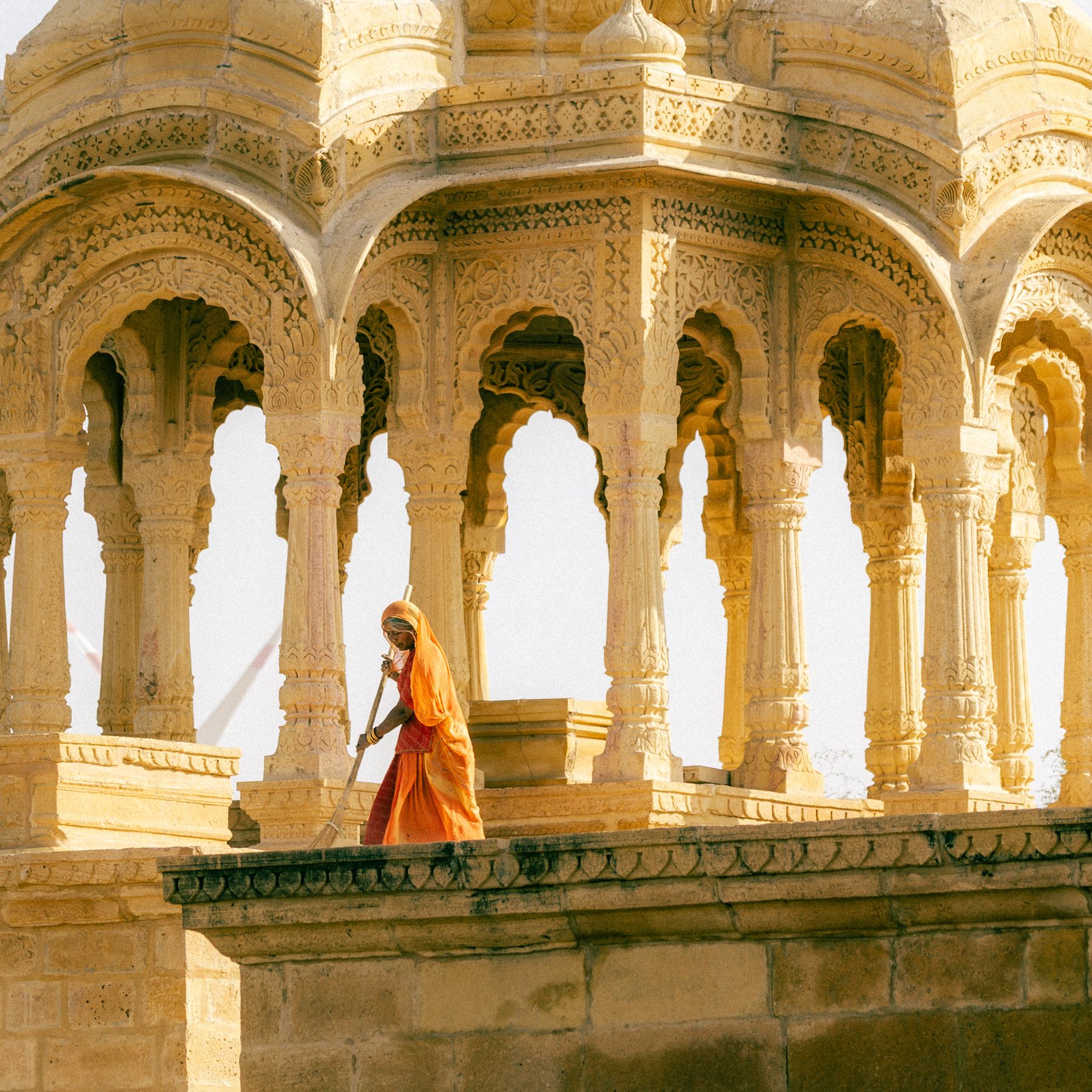 Woman Sweeping A Bada Bagh Pavilion